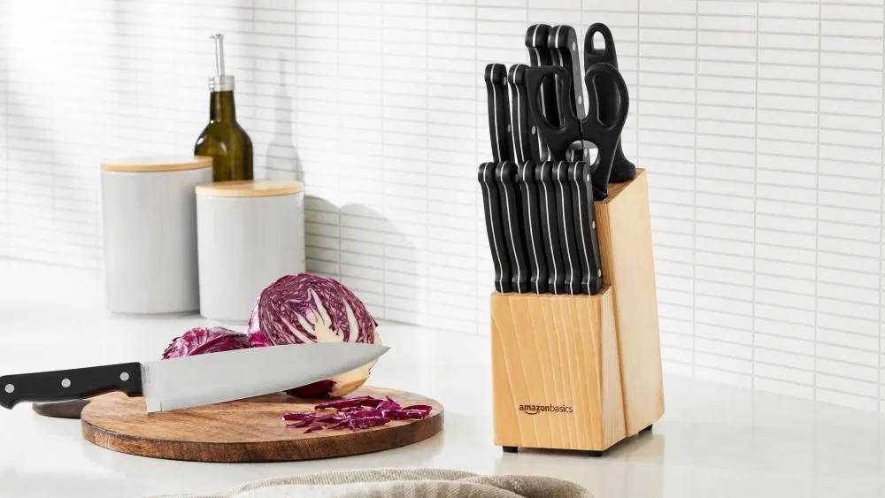 The Amazon Basics 14-piece set in its pinewood block.