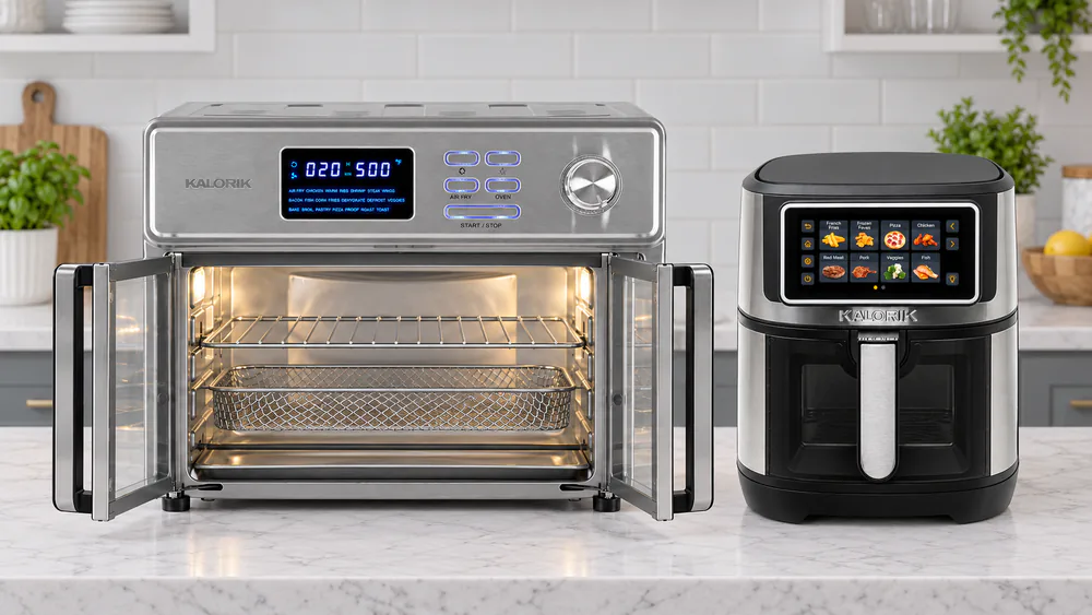 A 26-quart Kalorik MAXX oven with its French doors open beside a VIVID TOUCH basket fryer on a kitchen counter, showing the size difference