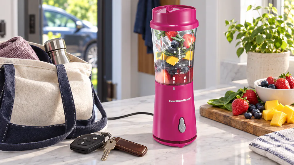 Hamilton Beach 51131 with its 14-oz travel jar fitted into a car cup holder.