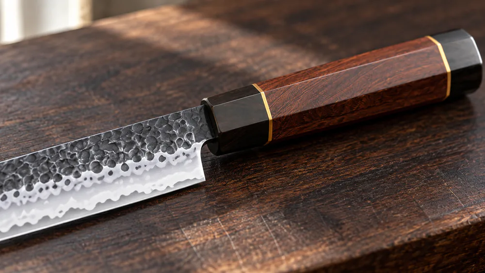 The HOSHANHO 10-inch yanagiba with rosewood handle and copper accents.