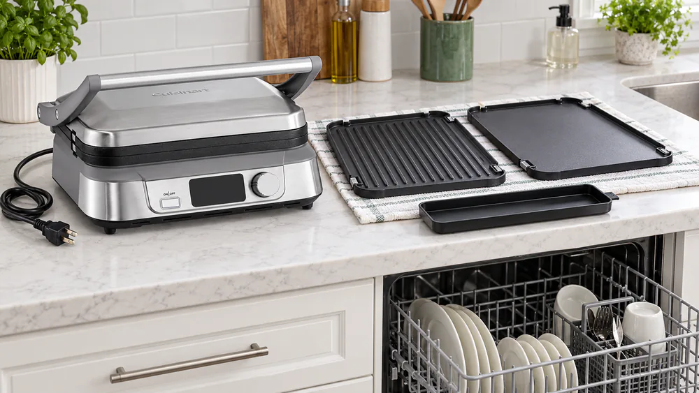 Removable Cuisinart Griddler Five nonstick plates and drip tray beside a dishwasher rack after a sandwich session