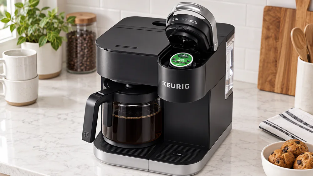 The Keurig K-Duo with a K-Cup in the single-serve holder and a full glass carafe on the warming plate