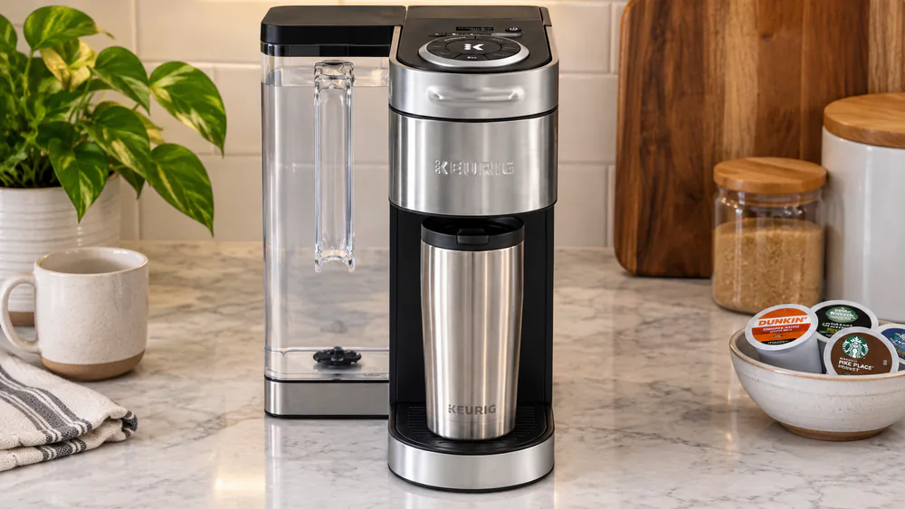 The K-Supreme Plus on a counter, digital display and stainless wrap visible.