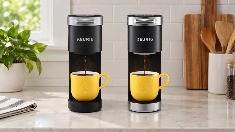 A Keurig K-Mini and K-Mini Plus side by side on a kitchen counter, the identical 4.5-inch-wide footprint visible from the front.