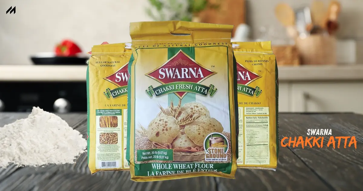 Swarna Chakki Atta packaging displayed with whole wheat flour and wheat grains, highlighting stone-ground natural goodness.