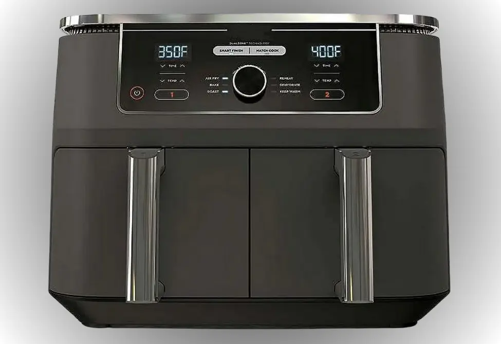 Ninja AD350CO dual-basket air fryer with digital display showing separate temperature controls for each zone.