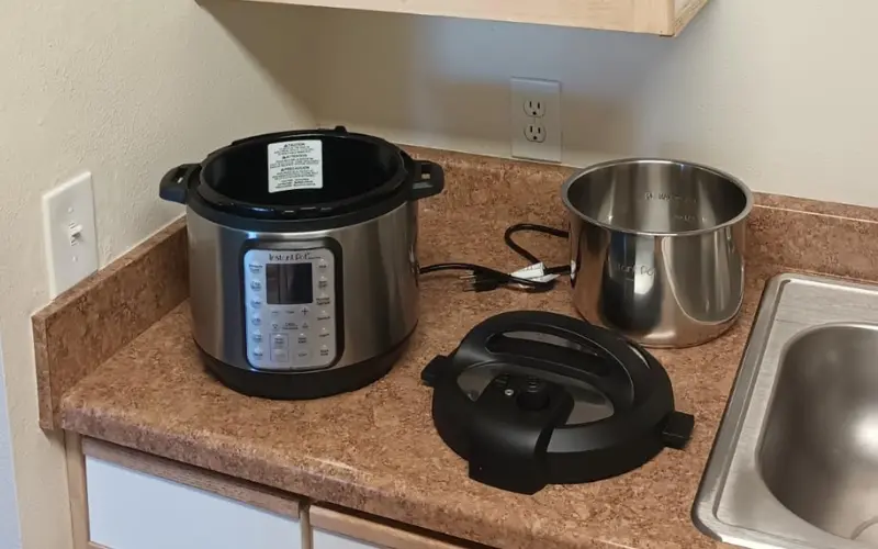 Instant Pot Duo Plus 9-in-1 Multicooker Review Instant Pot Duo Plus 9-in-1 Multicooker with accessories on kitchen counter