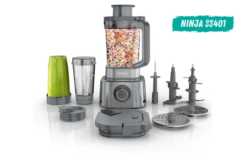 Ninja SS401 Blender Ninja SS401 blender system with food processor pitcher, single-serve cups, slicing and shredding discs, and multiple blade attachments on a white background