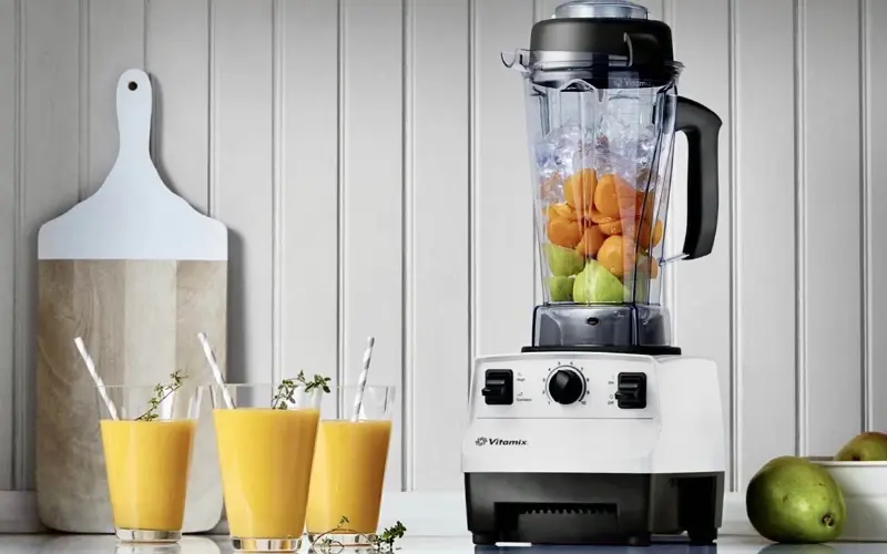 Vitamix 5200 Blender Review Vitamix 5200 high-performance blender making fruit smoothies on a modern kitchen counter